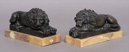 Appraisal: PAIR OF CONTINENTAL BRONZE FIGURES OF LIONS AFTER THORWALDSEN Each