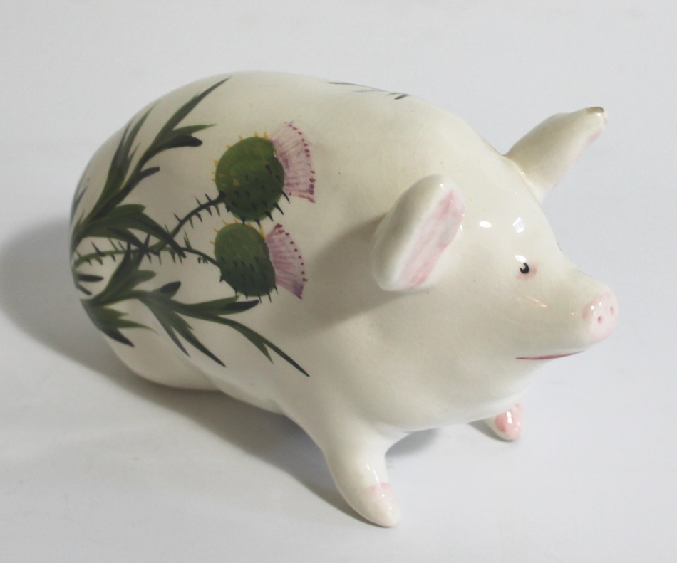 Appraisal: A thC Plichta London Wemyss style pottery pig seated and