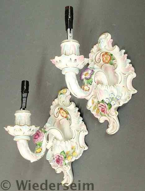 Appraisal: Pair of German porcelain wall sconces c with floral decoration