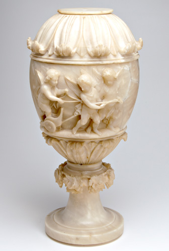 Appraisal: CONTINENTAL ALABASTER Large urn carved with winged putti around a