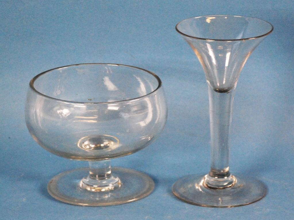 Appraisal: NINETEENTH CENTURY DRAWN TRUMPET SHAPED STEMMED GLASS with conical foot