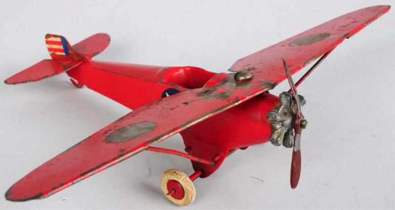 Appraisal: Britains Diecast Monoplane Toy Circa s Scarce red color variation