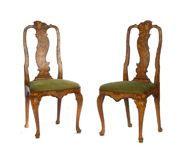 Appraisal: A pair of Dutch marquetry chairs height in width in