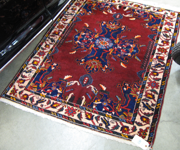 Appraisal: TWO PERSIAN HAMADAN AREA RUGS hand knotted central medallion and