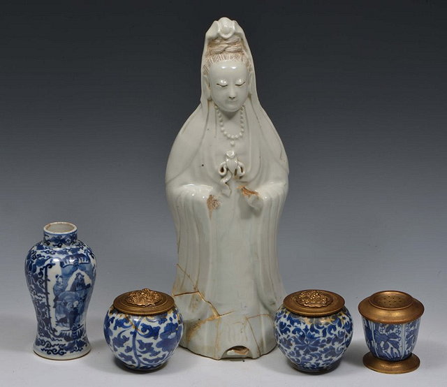 Appraisal: A CHINESE BLANC DE CHINE MODEL OF GUANYIN cm a