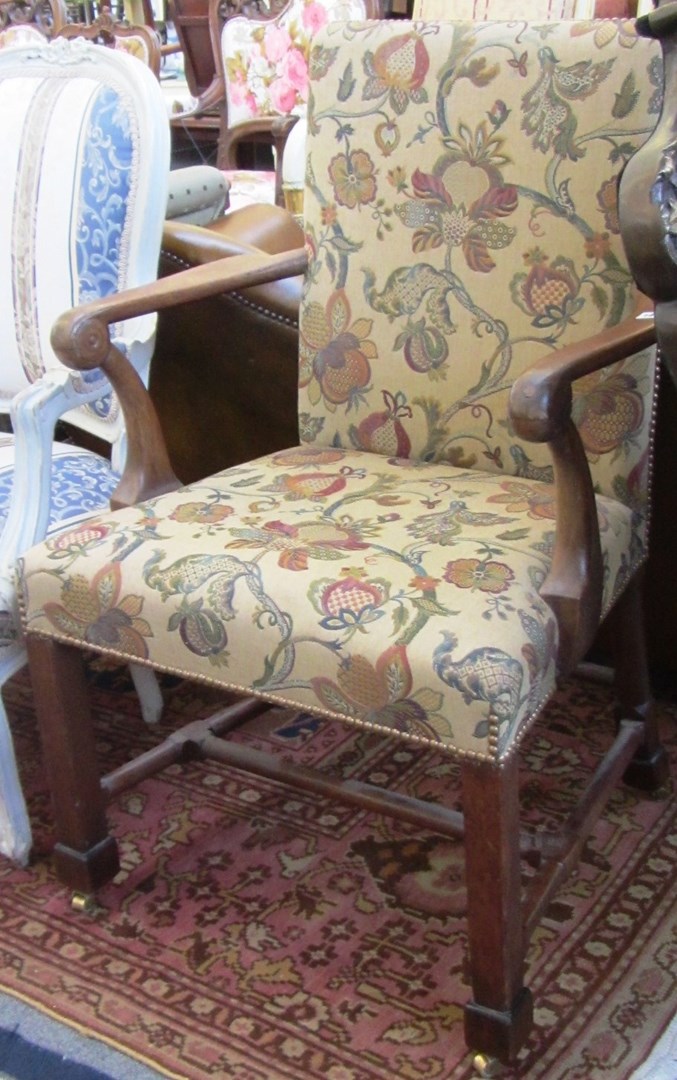 Appraisal: A George III mahogany framed open armchair on block and