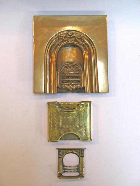 Appraisal: A MINIATURE SHEET BRASS HOB GRATE a cast brass miniature