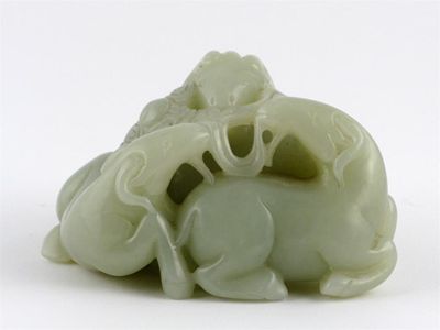 Appraisal: A Chinese jade carving of three goats all holding ruyi