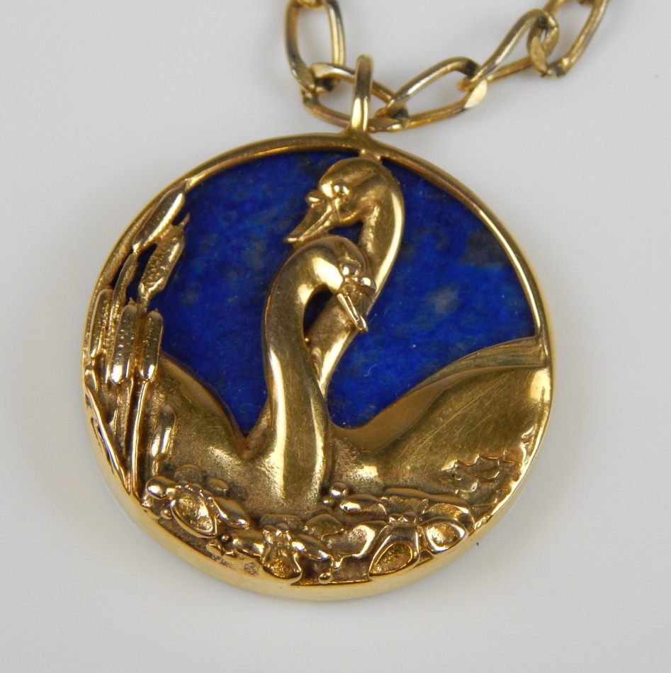 Appraisal: A swan pendant lapis lazuli oval back and chain yellow