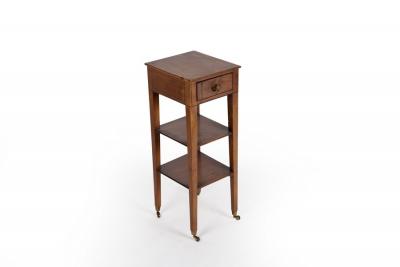 Appraisal: A Regency three-tier side table the top tier fitted a