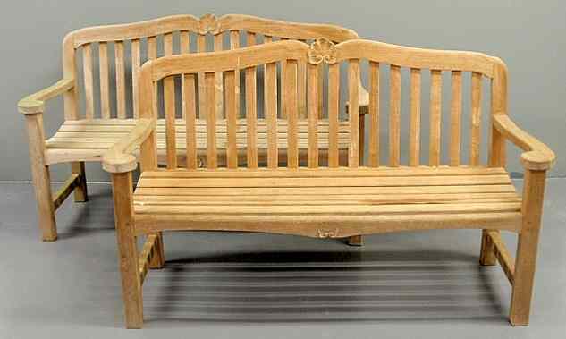 Appraisal: Pair of teakwood garden benches by Kingsley-Bate Fairfax Virginia h