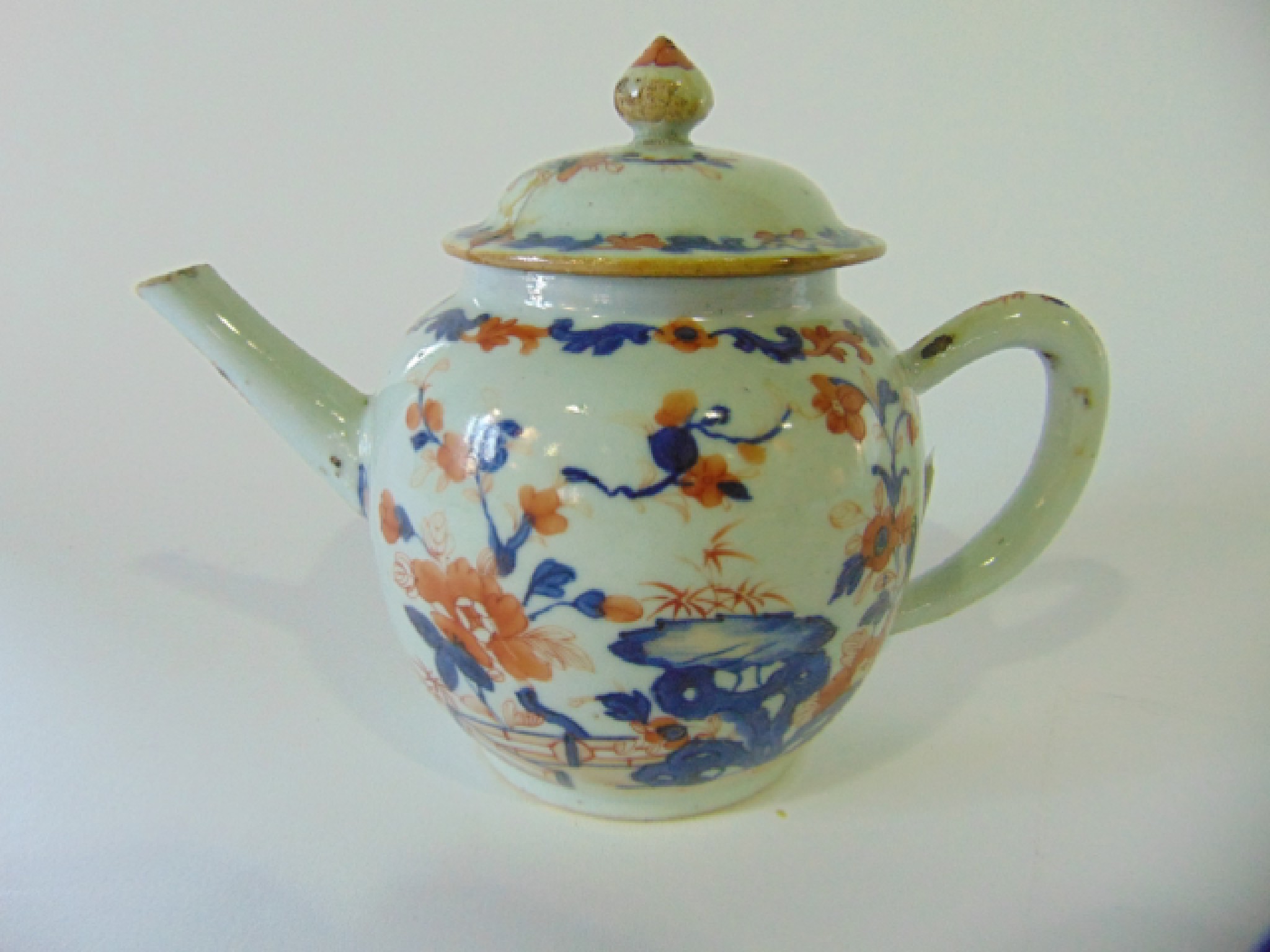 Appraisal: A th century oriental teapot of globular form with painted