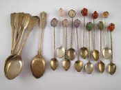 Appraisal: A set of eleven white metal untested coffee spoons with