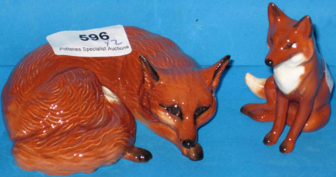 Appraisal: Beswick Fox seated and Fox Curled