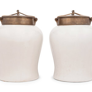 Appraisal: A Pair of Brass Mounted White Glazed Porcelain Jars th