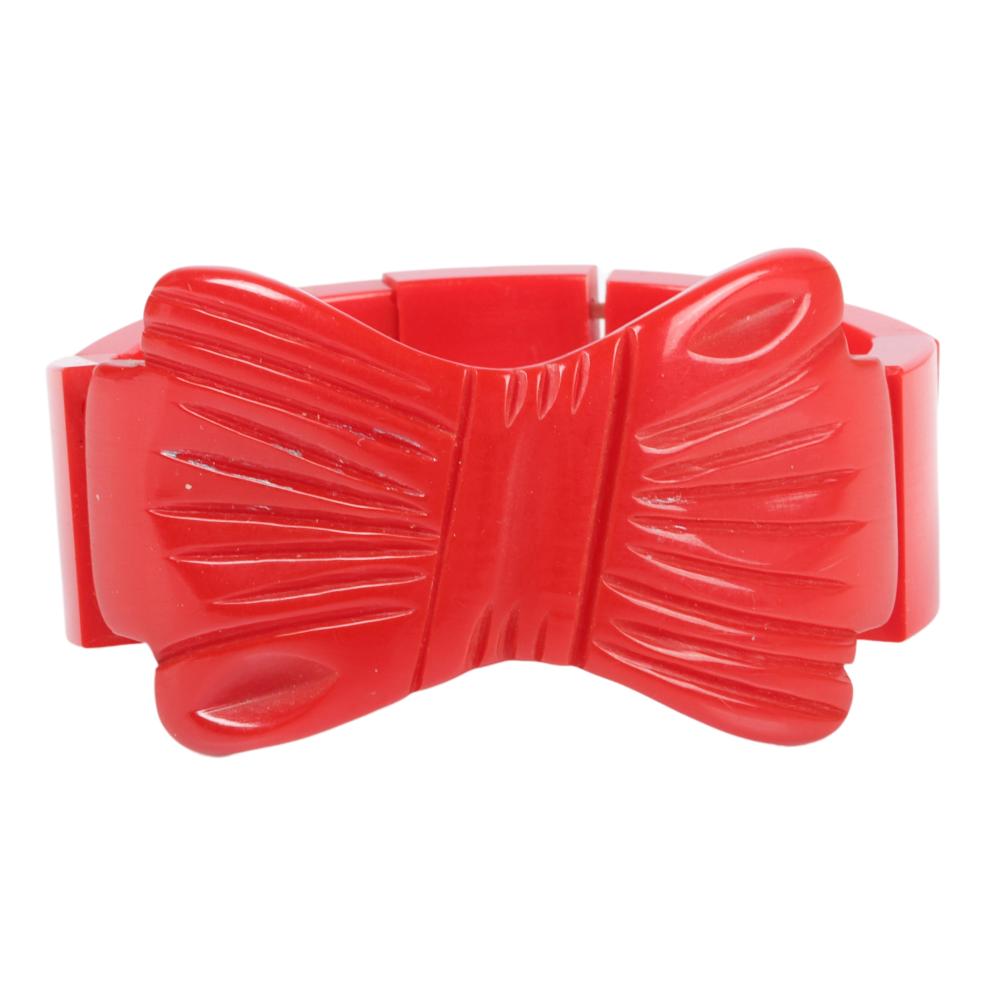 Appraisal: RED BAKELITE STRETCH BRACELET WITH BOW W X INNER DIAM