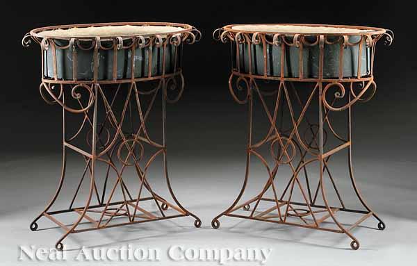 Appraisal: A Pair of T le and Wrought Iron Jardini res