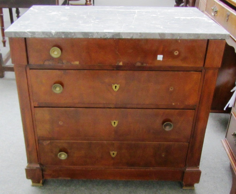 Appraisal: A small early th century continental walnut commode the marble