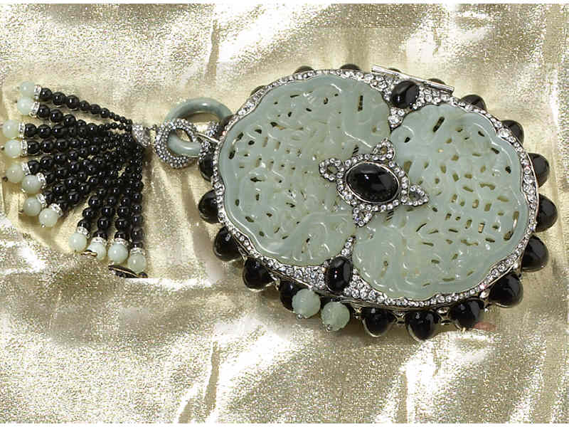 Appraisal: MINT JADE AND ONYX CLUTCH PURSE BY IRADJ MOINI An