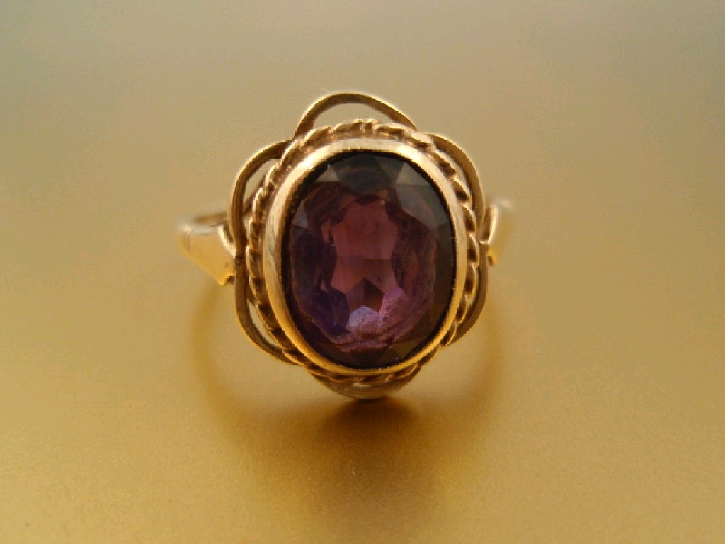 Appraisal: An amethyst set dress to yellow metal shank stamped for