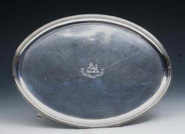 Appraisal: A GEORGE III SILVER SALVER oval shaped with reeded rim