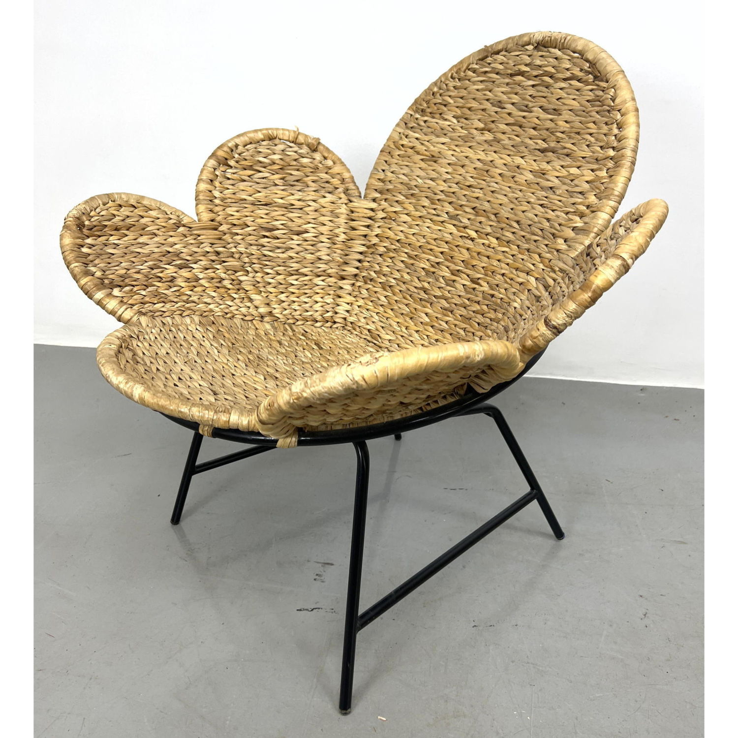 Appraisal: Decorator Woven Rattan Lounge Chair with Iron Hoop Frame Lobed