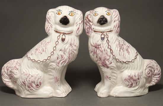 Appraisal: Pair of Staffordshire molded earthenware and luster decorated Spaniels th