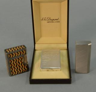 Appraisal: Three lighters including St Dupont silver lighter brand new in