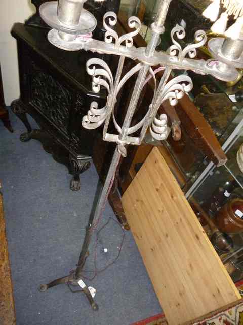 Appraisal: A WROUGHT IRON ADJUSTABLE LAMP STANDARD high