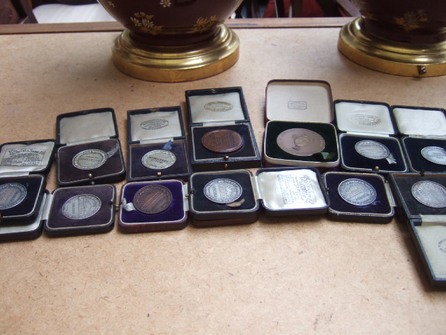 Appraisal: Nine silver Lawn Tennis Association prize medallions as awarded to