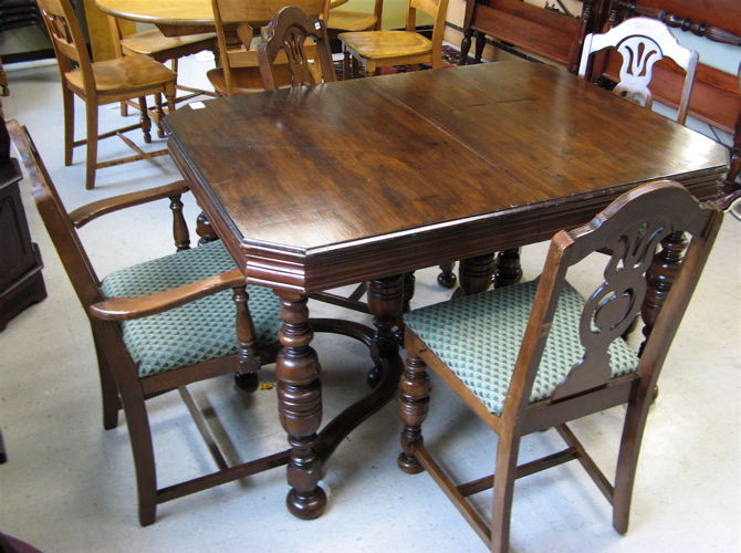 Appraisal: WALNUT DINING TABLE AND CHAIR SET American c 's comprising