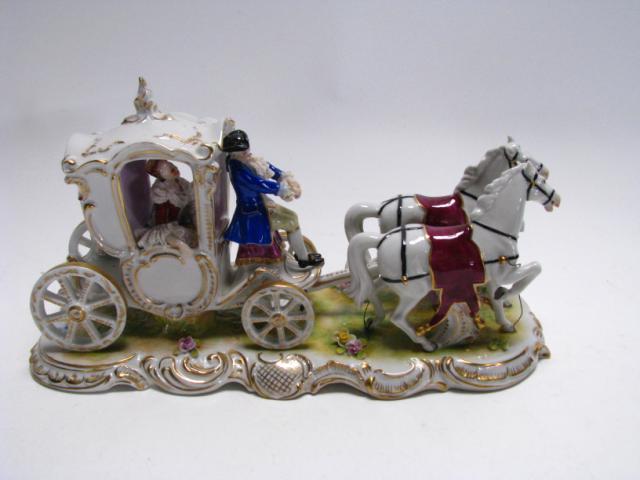 Appraisal: Dresden German porcelain Horse Drawn Carriage depicting two horses pulling