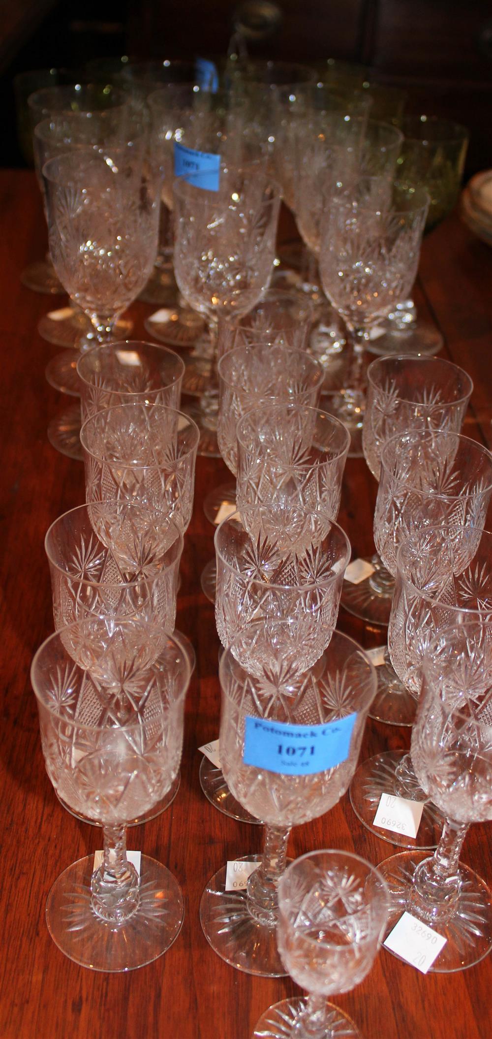 Appraisal: CRYSTAL STEMWARE water goblets - h in green-tinged wine glasses