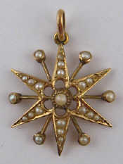 Appraisal: A Victorian yellow metal tests carat gold seed pearl star