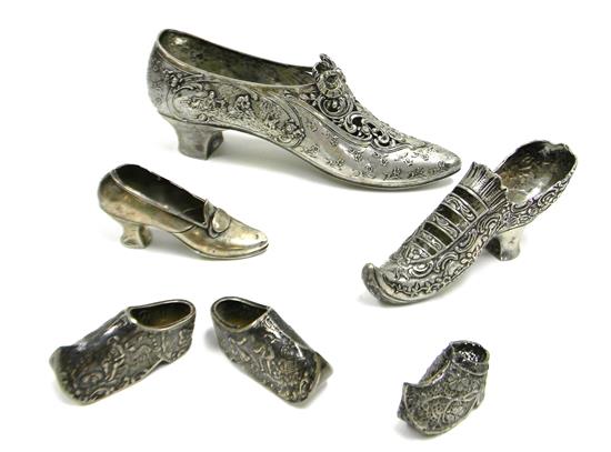 Appraisal: SILVER tested and sterling silver shoes six pieces Birmingham sterling