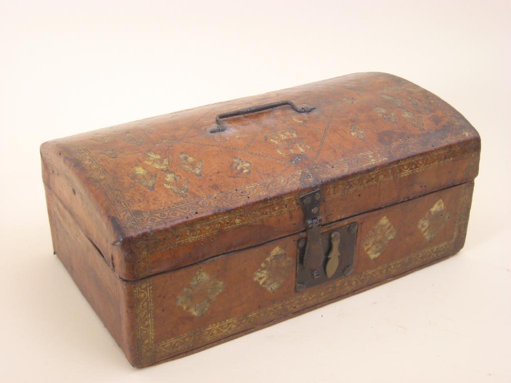 Appraisal: A leather bound Box with domed lid and tooled gilt