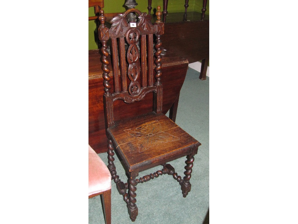 Appraisal: Carved oak hall chair