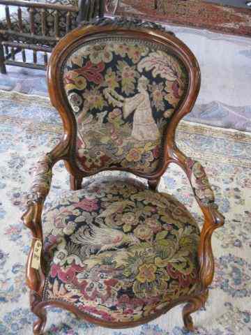 Appraisal: th Century Carved Rosewood Arm Chair elaborate needlepoint with figure