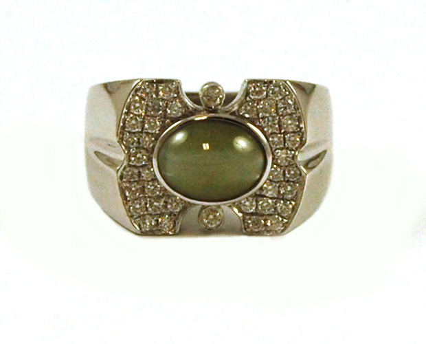 Appraisal: MAN'S CAT'S EYE AND FOURTEEN KARAT WHITE GOLD RING featuring