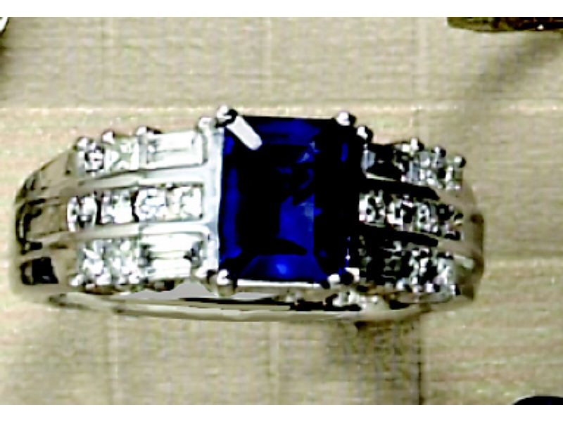 Appraisal: SAPPHIRE AND DIAMOND RING K white gold triple row design