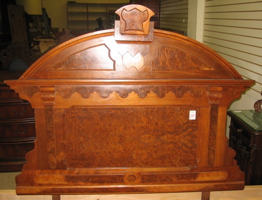 Appraisal: A VICTORIAN WALNUT BED WITH RAILS Renaissance Revival American c