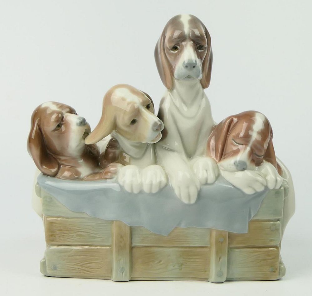 Appraisal: LARGE LLADRO BEAGLE PUPPIES IN BASKET Measures across glossy Condition