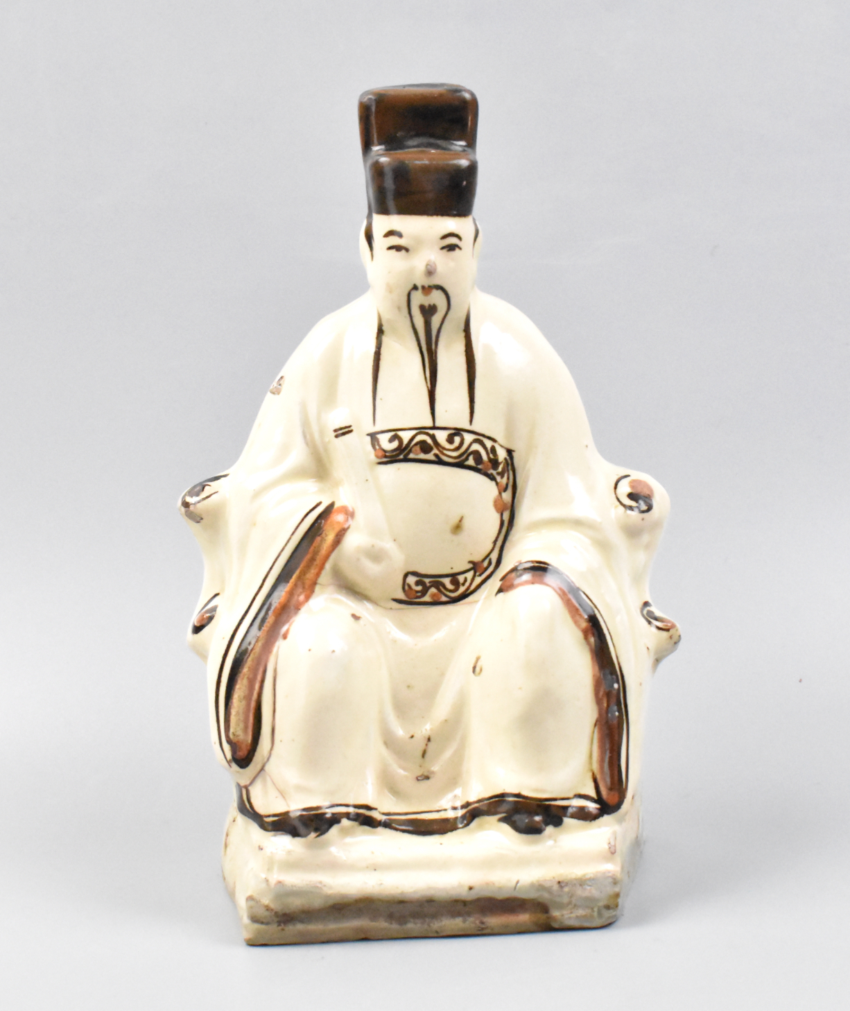 Appraisal: A Chinese Cizhou ware seated figure dated to Ming Dynasty