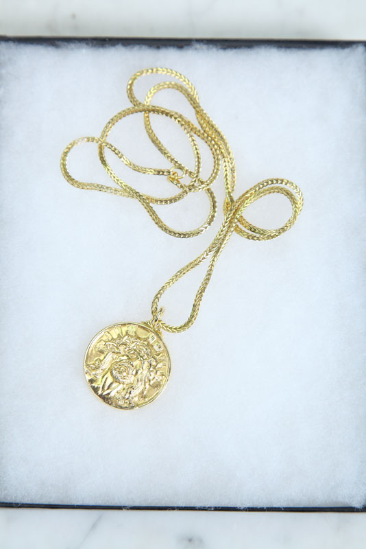 Appraisal: GOLD NECKLACE Chain and medallion both marked k dwt