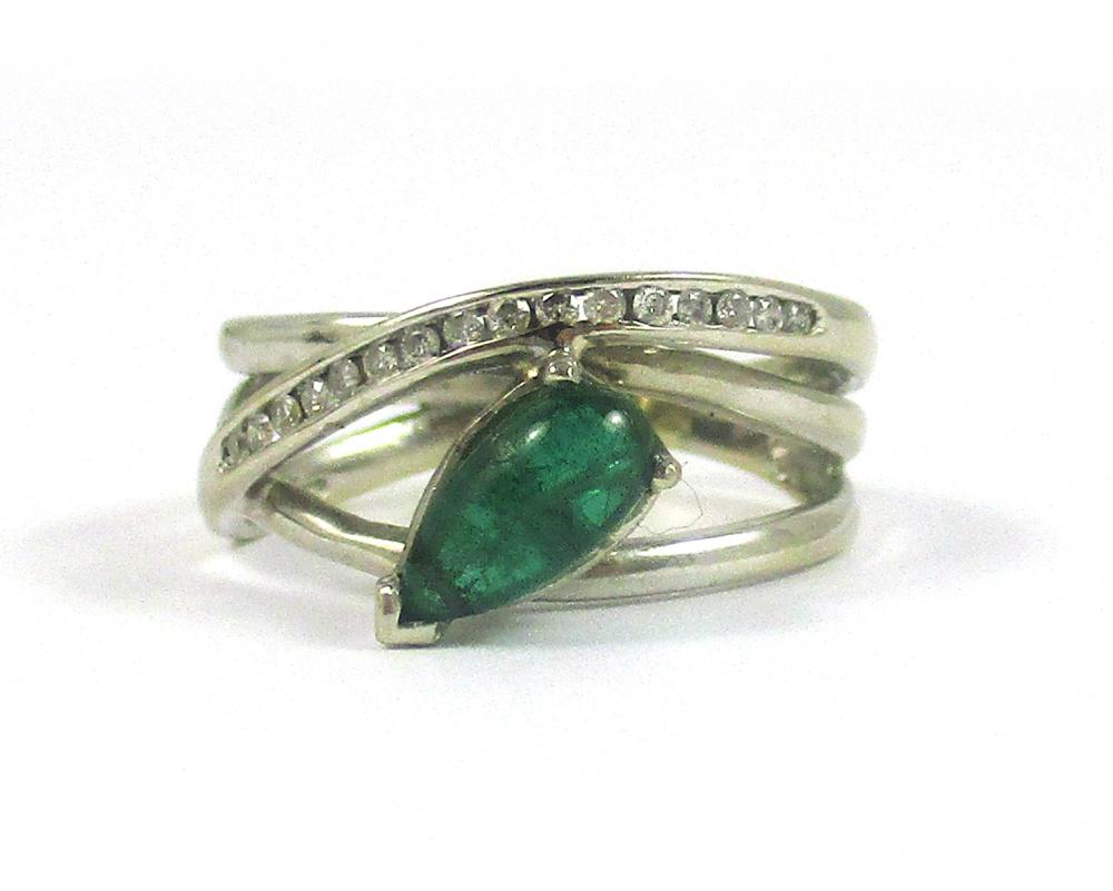 Appraisal: EMERALD DIAMOND AND FOURTEEN KARAT GOLD RING The k white