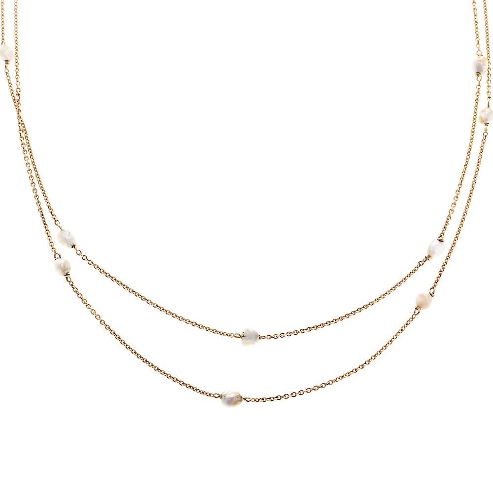 Appraisal: A Ladies Long Pearl Station Necklace in K K yellow