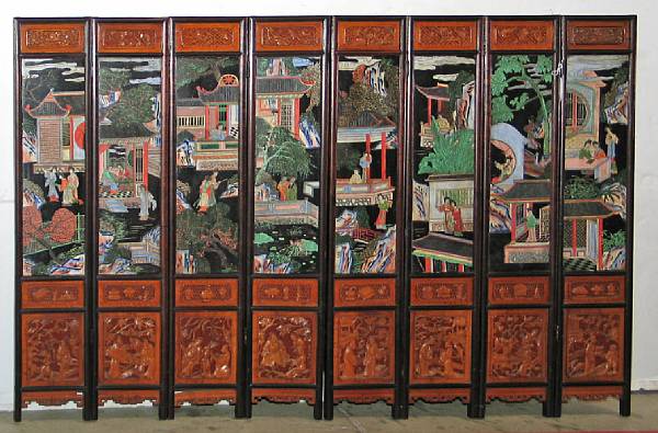 Appraisal: A small eight-panel wood screen with carved wood and coromandel