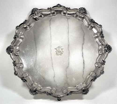 Appraisal: A late Victorian silver circular salver with shaped piecrust and