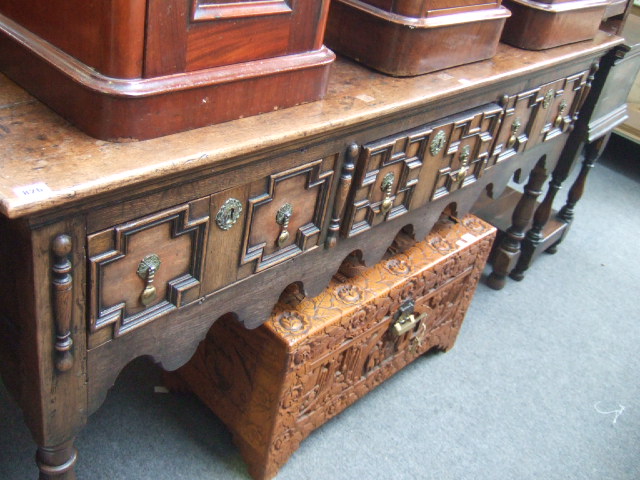 Appraisal: An early th century oak dresser base the two plank