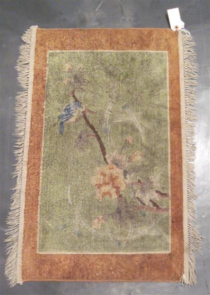 Appraisal: Chinese silk rug The silk rug depicts a bird on